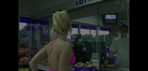  Blonde teen walks into market nude